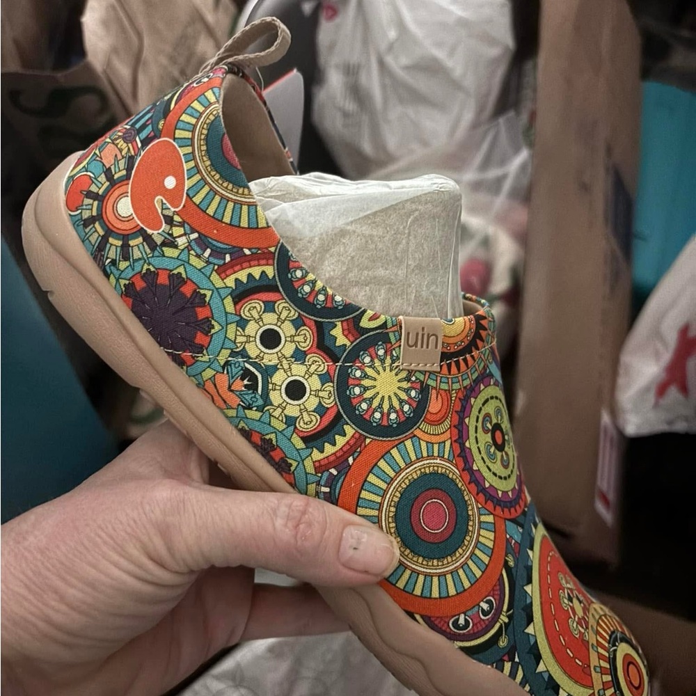 UIN Orange and Green Flats with Intricate Patterns
